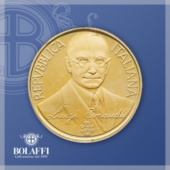 Ritratto di Luigi Einaudi su moneta d'oro 100.000 lire