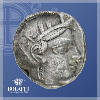 Ritratto della dea Atena su moneta d'argento dell'Antica Grecia
