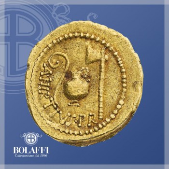 Moneta d'oro di Giulio cesare con iscrizione sul console Aulo Irzio